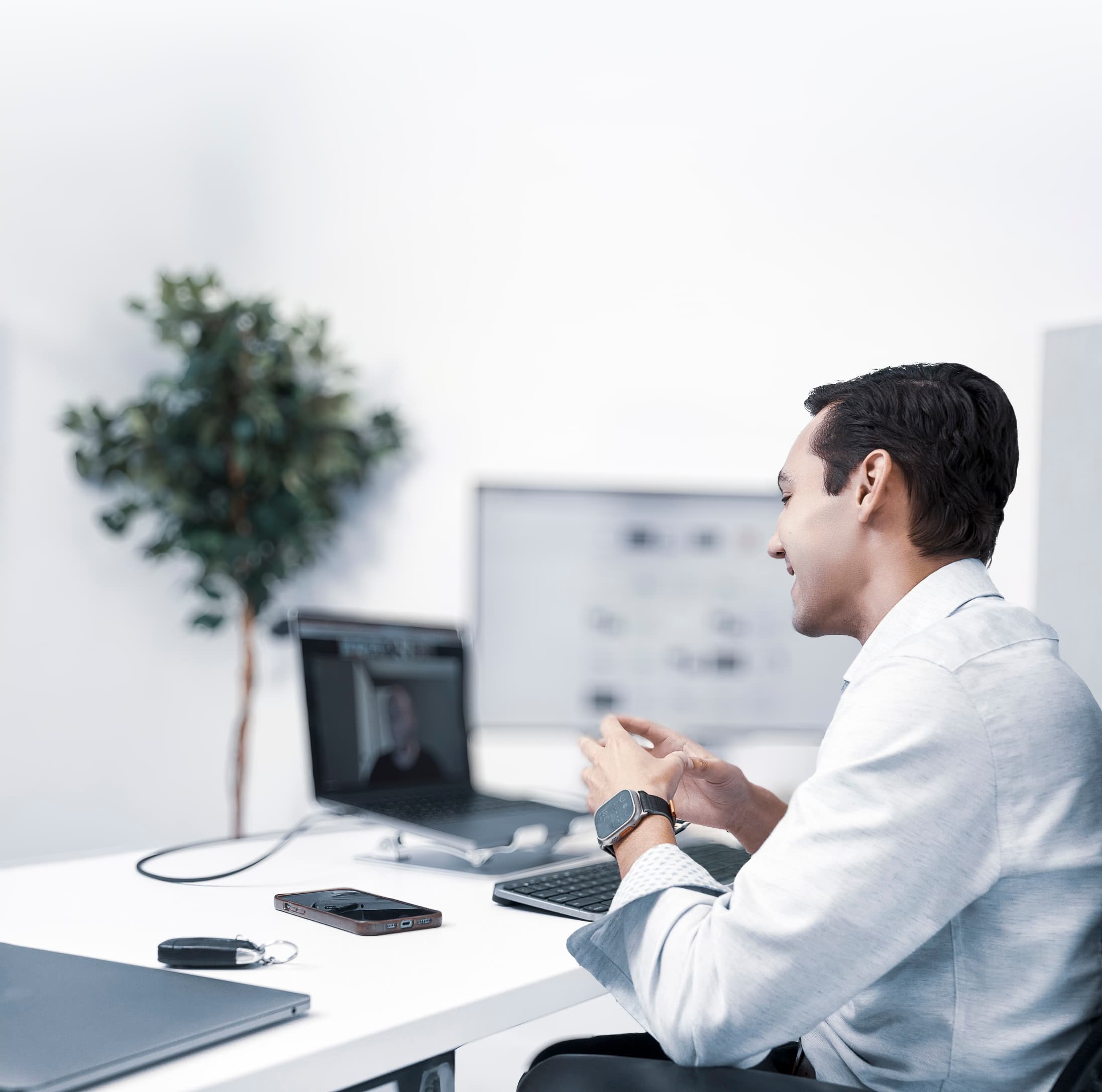 Man on a video call with subtle, desaturated color grading