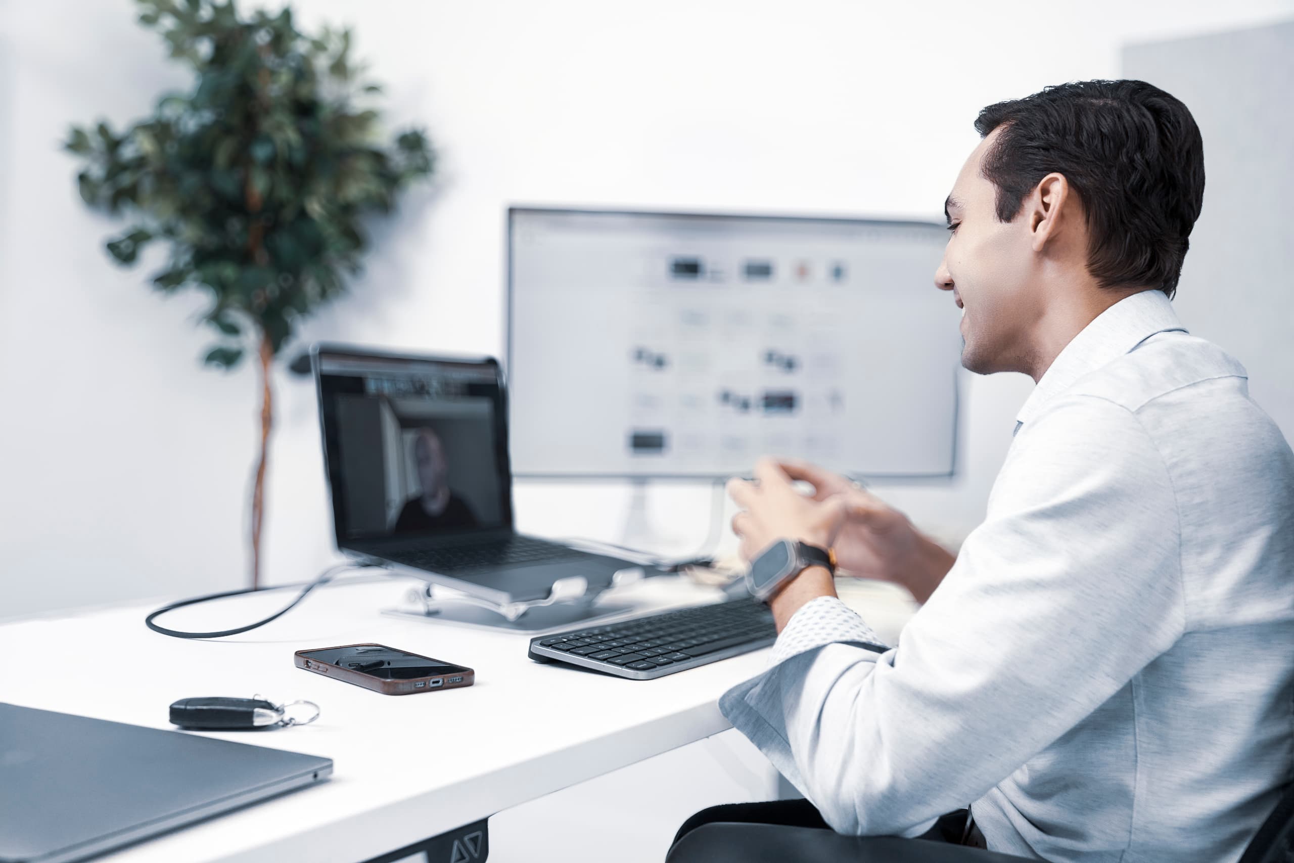 Man smiling naturally during a video call