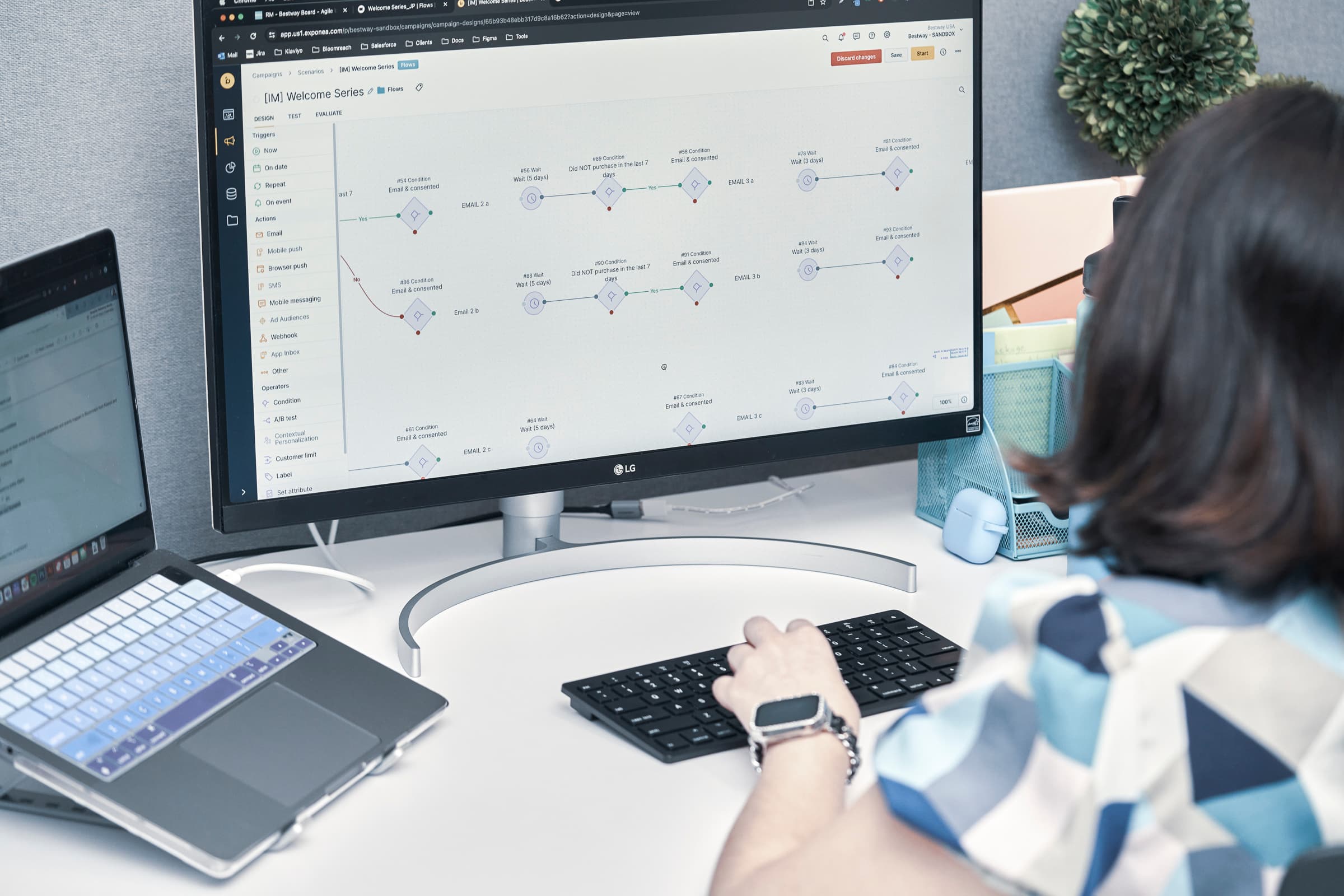 Woman reviewing an automation workflow on screen